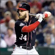  ?? AP file photo ?? Bryce Harper (above) of the Washington Nationals and Manny Machado of the Los Angeles Dodgers are the cream of this winter’s free-agent crop. Last season was a struggle at times for Harper who ended up with 34 home runs and 100 RBI.