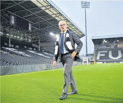  ??  ?? Fulham manager Claudio Ranieri walks on the pitch at the club’s Craven Cottage.