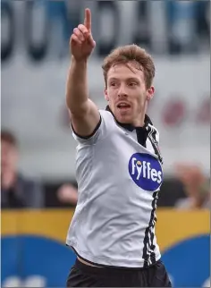  ??  ?? David McMillan celebrates his first goal.