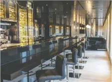  ?? AaRON SAUNDERS ?? Bathed in brass accents and a charcoal colour palette, the Scenic Eclipse boasts 10 different dining venues.