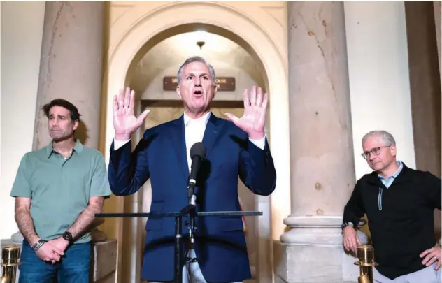  ?? Associated Press ?? ↑
Speaker of the House Kevin Mccarthy talks to reporters at the Capitol in Washington, US, on Sunday.