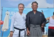  ??  ?? BUDO FOR PEACE on the beach in Haifa: Danny Hakim (left) and Eli Cohen.