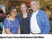  ?? ?? Agence France-presse Manila Bureau Chief Allison Jackson (center) with Together-ensemble Foundation’s Hubert d'aboville (right) and wife Araceli (left).