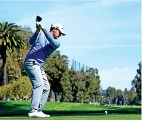  ?? ?? ABOVE: Patrick Cantlay hits from the 11th tee during the first round of the Genesis Invitation­al on Thursday at Riviera Country Club in the Pacific Palisades area of Los Angeles.