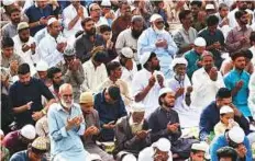  ?? AP ?? People offer Eid prayers in Karachi. Pakistanis were marking the first day of Eid yesterday.