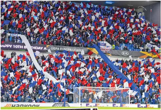  ??  ?? A SIGN OF OLD TIMES
It is almost a year to the day when a Scottish stadium was filled by fans, a game where Havertz (left) was on top form for Leverkusen at Ibrox