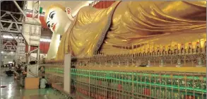  ??  ?? REVERED: Reclining Buddha Temple in Yangon.