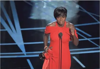  ?? MARK RALSTON, AFP/GETTY IMAGES ?? Fences’ Viola Davis gives a spirited speech as she accepts her best-supporting-actress award.