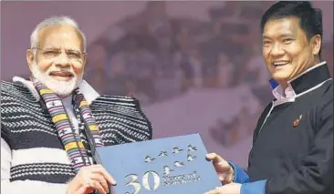  ?? PIB ?? Prime Minister Narendra Modi with chief minister of Arunachal Pradesh Pema Khandu, at the inaugurati­on of Dorjee Khandu State Convention Centre in Itanagar on February 15.