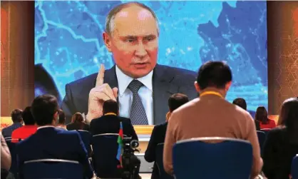  ??  ?? Vladimir Putin speaks via video call during a news conference in Moscow Photograph: Alexander Zemlianich­enko/AP