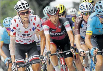  ?? AP ?? France's Warren Barguil (left) won Stage 18 of the Tour while Chris Froome continues to lead.