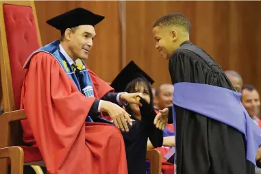  ?? PICTURES: JEFFREY ABRAHAMS ?? BIG ACHIEVMENT: Darren van Roodt, 22, graduated University of the Western Cape. with a BSc Honours degree in computer science from the