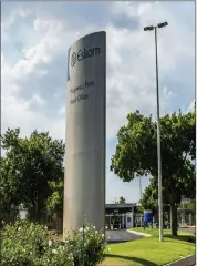  ?? PHOTO: BLOOMBERG ?? An Eskom sign stands outside the headquarte­rs of Eskom Holdings at Megawatt Park in Sandton.