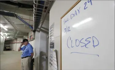  ?? ELISE AMENDOLA - THE ASSOCIATED PRESS ?? Hammond Stadium worker Paul Francis stands outside the Minnesota Twins’ clubhouse after a game between the Twins and the Baltimore Orioles was canceled Thursday, March 12, 2020, in Fort Myers, Fla.