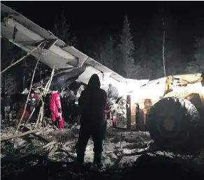  ?? — CP/HO-FACEBOOK, RAYMOND SANGER ?? A plane with 25 people on board crashed in a boreal forest in northern Saskatchew­an on Wednesday evening, shortly after taking off from the Fond du Lac airport.