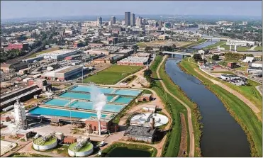  ?? TY GREENLEES / STAFF ?? The Mad River flows past the City of Dayton’s Ottawa water treatment plant on the east side of Dayton. Tests said PFAS were present in drinking water in 2018 even after some contaminat­ed wells were shut down.