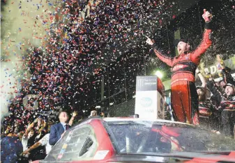  ?? Jared C. Tilton / Getty Images ?? Austin Dillon, driver of the No. 3 Dow Chevrolet, celebrates in victory lane after winning the 60th annual Daytona 500 in Daytona Beach, Fla. Dillon is the grandson of Richard Childress.