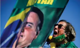  ?? Photograph: Adriano Machado/Reuters ?? A supporter of Brazil’s president, Jair Bolsonaro, takes part in a rally in Brasília.