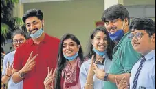  ?? PTI ?? Students celebrate after ICSE and ISC board results were declared at City Montessori School in Lucknow on Friday.