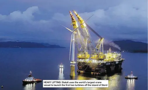  ??  ?? HEAVY LIFTING: Statoil uses the world’s largest crane vessel to launch the first two turbines off the island of Stord