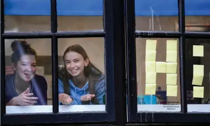  ??  ?? Glasgow University students in lockdown at a hall of residence. ‘The situation is extraordin­arily difficult, with cases at about 40 universiti­es so far and further outbreaks expected.’ Photograph: Jeff J Mitchell/Getty Images