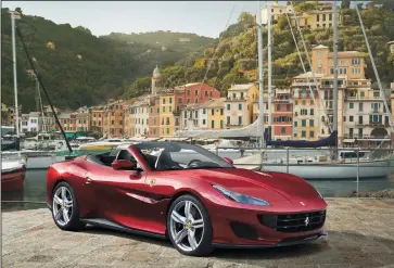  ?? FERRARI ?? A two-door four-seater with a retracting convertibl­e hardtop, the 2019 Ferrari Portofino is powered by a front-mounted 3.9-liter twin-turbo V8 engine that puts out 591 horsepower and 561 pound-feet of torque.