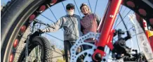  ?? TIM KROCHAK • THE CHRONICLE HERALD ?? Wayne and Allana Loh stand with their fat wheel bikes in Dartmouth on Thursday.
