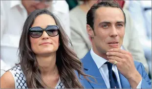  ?? PICTURE: BACKPAGEPI­XI ?? Pippa and James Middleton take their seats in the royal box at Wimbledon.