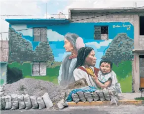  ?? ?? A mural by artist Miguel Tenorio on a house Sept. 10 in Mexico City’s sprawling borough of Iztapalapa.