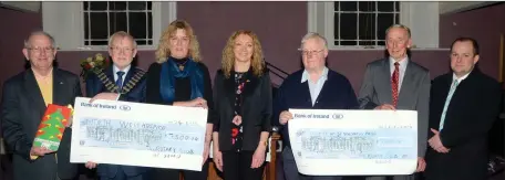  ??  ?? Members of Sligo Rotary Club presenting cheques to North West Hospice and Sligo St. Vincent de Paul, proceeds from the collection at the Remembranc­e Tree in O’Connell Street during Christmas week. Pictured: L- R. Gerry Cannon, Rotary Club with Book of...