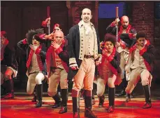  ?? JOAN MARCUS ?? Composer and star Lin-Manuel Miranda, centre, has helped make the stage play Hamilton a highly sought-after ticket.