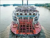  ??  ?? The American Queen cruises on the Mississipp­i River, which is attracting increased attention from cruise lines.