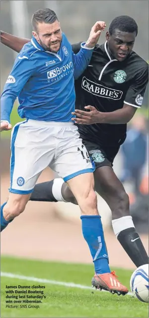  ?? Picture: SNS Group. ?? James Dunne clashes with Daniel Boateng during last Saturday’s win over Hibernian.