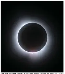  ?? (Arkansas Democrat-Gazette/Colin Murphey) ?? The sun reaches totality during the solar eclipse as seen at Burns Park in North Little Rock on Monday.