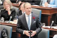  ?? TORONTO STAR FILE PHOTO ?? Peter Bethlenfal­vy, president of the Treasury Board, announced three school boards and 39 municipali­ties are taking advantage of provincial­ly funded financial audits.
