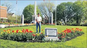  ??  ?? JULIE COLLINS/CAPE BRETON POST Maintainin­g the cenotaph and grounds is a priority for Armstrong Memorial branch 19 Royal Canadian Legion and its president Carl Wall.