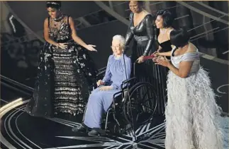  ??  ?? JANELLE MONAE introduces Katherine Johnson with Taraji P. Henson and Octavia Spencer.