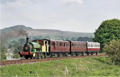  ?? MIKE TAYLOR ?? Hudswell Clarke 0‑6‑0St Mitchell/Illingwort­h passes Bow Bridge on the Embsay & Bolton Abbey railway with a vintage train on May 27.