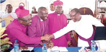  ??  ?? Diocesan Bishop, Rt. Revd. Tubokosemi­e Robinson Abere (right) receives some Bishops during the Synod