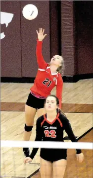  ?? Photograph by Mark Humphrey ?? Pea Ridge junior Gabby Adams serves during the Lady Blackhawks’ 25-16, 25-13, 25-9 sweep of Gravette during a must-win opening-round game of the District 4A-1 volleyball tournament last Tuesday, Oct. 17 at Lincoln. The victory earned the Lady...