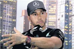  ?? AFP ?? Mercedes driver Lewis Hamilton attends a press conference at the Albert Park circuit in Melbourne.