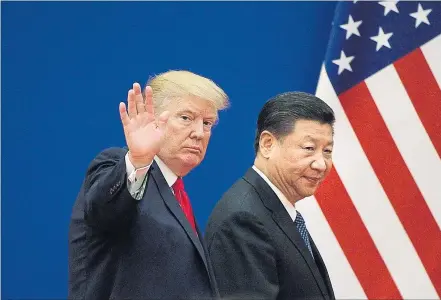  ?? [ AFP ] ?? Es gibt nichts mehr zu lächeln: Die USA und China stehen ab Freitag in einem Handelskri­eg.