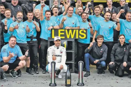  ?? GETTY IMAGES ?? Mercedes’ Lewis Hamilton (centre) won the last race at the Baku City Circuit in Azerbaijan but the Briton admitted that luck played a part in his victory.