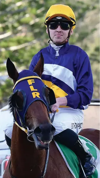  ?? Picture: COURIER-MAIL/TRACKSIDE PHOTOGRAPH­Y ?? Ben Thompson on Ipswich winner Scottish Mist.