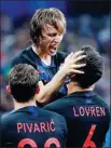  ?? REUTERS ?? Croatia’s Luka Modric and Dejan Lovren celebrate victory.