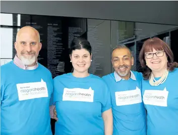  ?? SUPPLIED PHOTO ?? Niagara Health Foundation President and CEO Roger Ali, second from right, stands with foundation team members Merritt Kalagian, research and chief privacy officer, Elyse Howarth, communicat­ions and marketing officer, and Carrie Zeffiro, senior director...