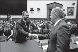  ?? [PATRICK SEMANSKY/THE ASSOCIATED PRESS] ?? Facebook Head of Global Policy Developmen­t Matt Perault, left, greets Rep. David Cicilline, chair of the House Judiciary antitrust subcommitt­ee, at a hearing on July 16 in Washington. Cicilline has criticized the conduct of big technology companies and said legislativ­e or regulatory changes may be needed.