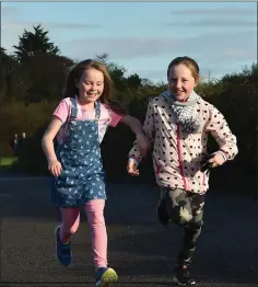  ??  ?? Alisha Hall and Abbie Free during the Arklow Duck Pond junior parkrun.