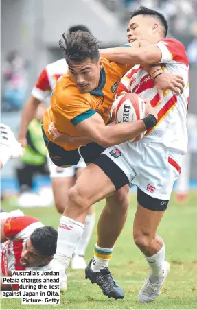  ?? ?? Australia’s Jordan Petaia charges ahead during the Test against Japan in Oita. Picture: Getty