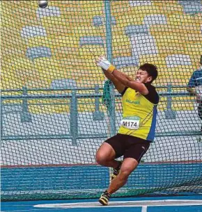  ?? BERNAMA PIC ?? Jackie Wong clinches silver in the hammer throw event at the Malaysian Open Grand Prix yesterday.